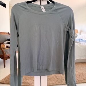 Swiftly Tech Long-Sleeve Shirt 2.0
Waist Length